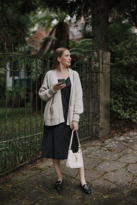 Casaco Tricot Amplo - Pati com modelagem ampla e bolsos frontais